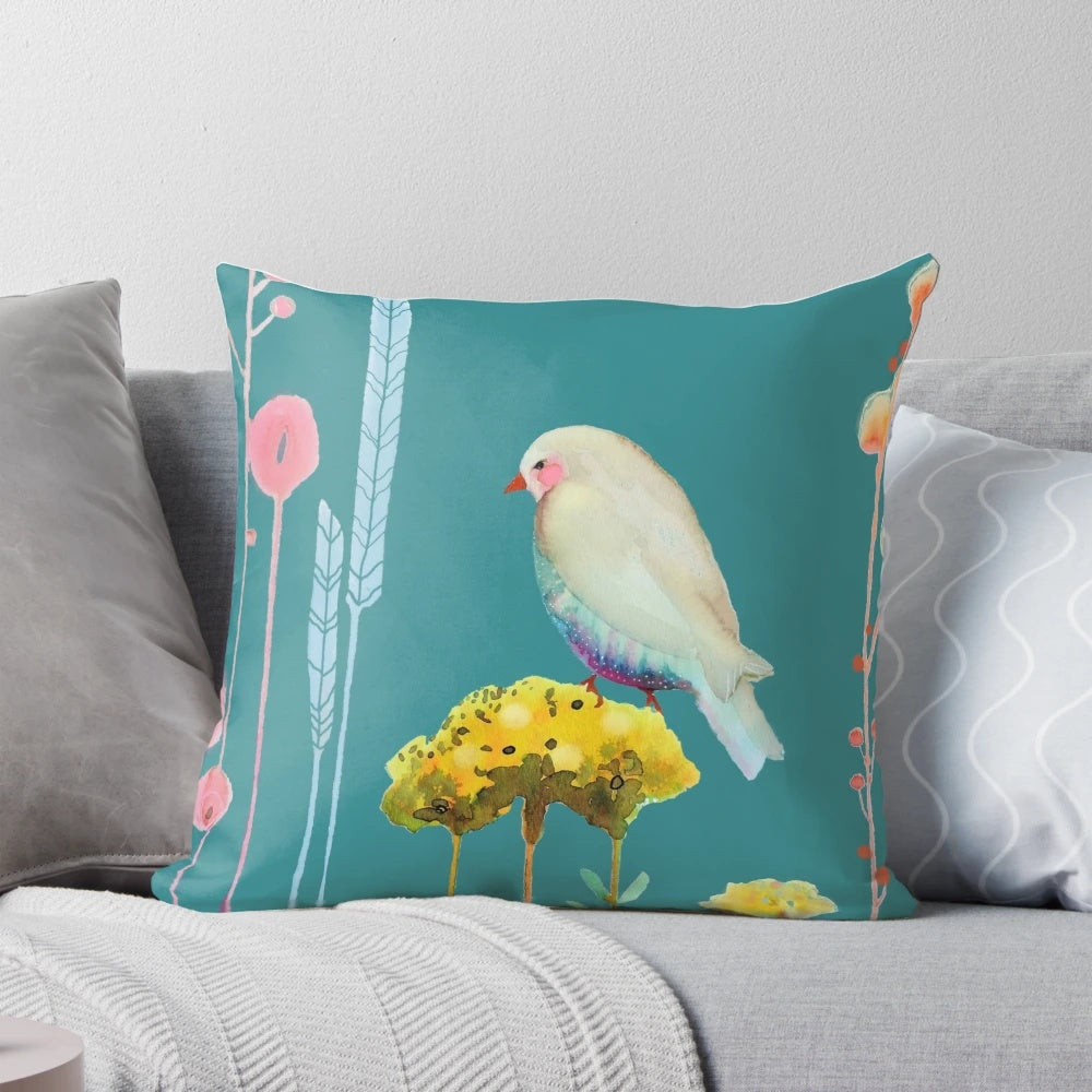 Colorful and serene decorative pillow with bird, flower, and leaf motifs