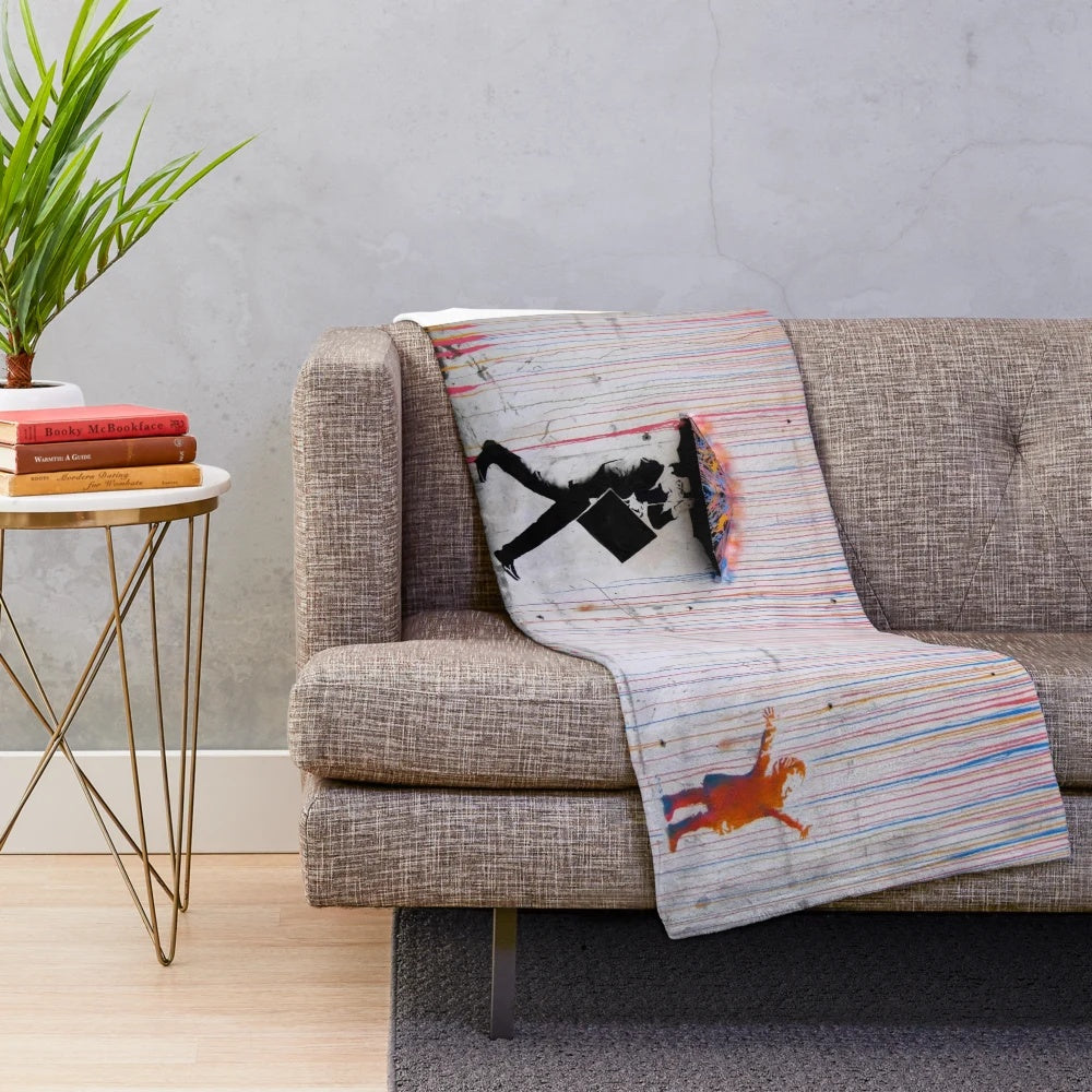 Cozy plush blanket featuring a vibrant, street art-inspired design of a girl with a rainbow umbrella