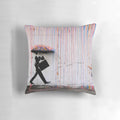Colorful pillow design featuring a Banksy-inspired image of a girl holding a rainbow umbrella