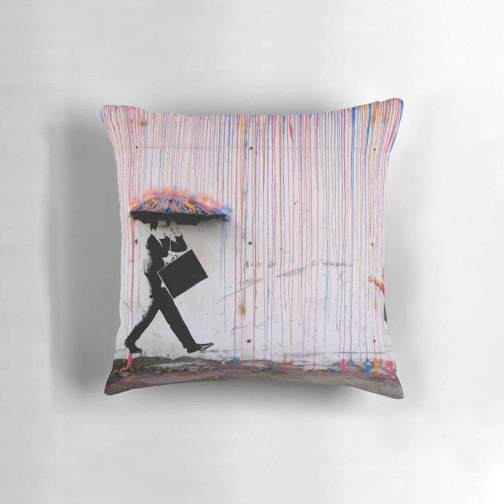 Colorful pillow design featuring a Banksy-inspired image of a girl holding a rainbow umbrella