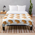 Colorful beaver-themed plush blanket with abstract design