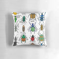 Detailed illustration of colorful beetles, bugs, and insects on a decorative throw pillow.