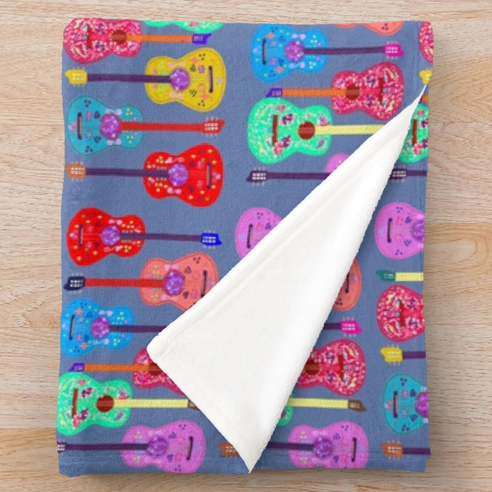 Colorful boho-style guitar plush blanket
