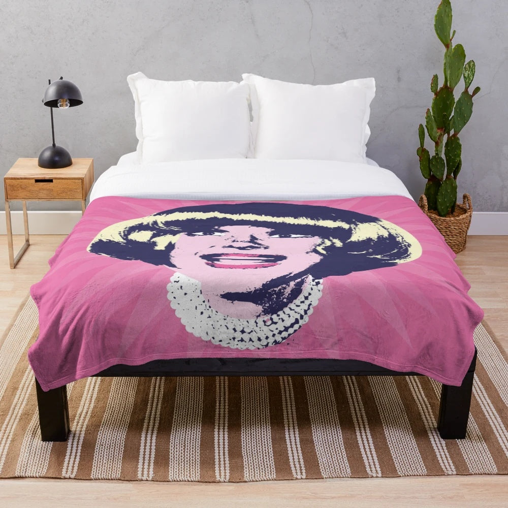 Colorful plush blanket featuring a pop art tribute design of Carol Channing, the iconic 80s TV and movie star
