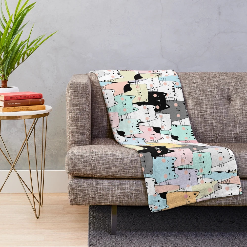 Colorful cat plush blanket with various cat illustrations