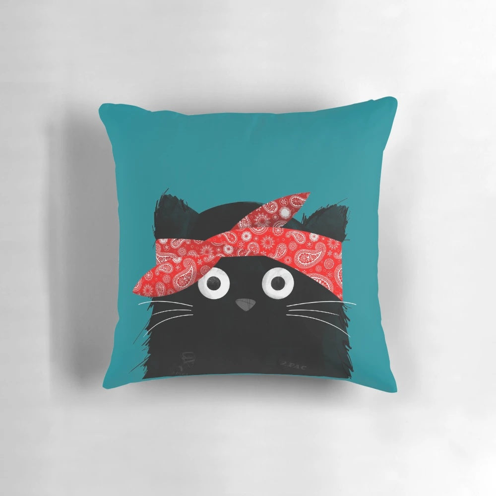 Colorful graphic design of cat with Tupac-inspired styling on a plush pillow