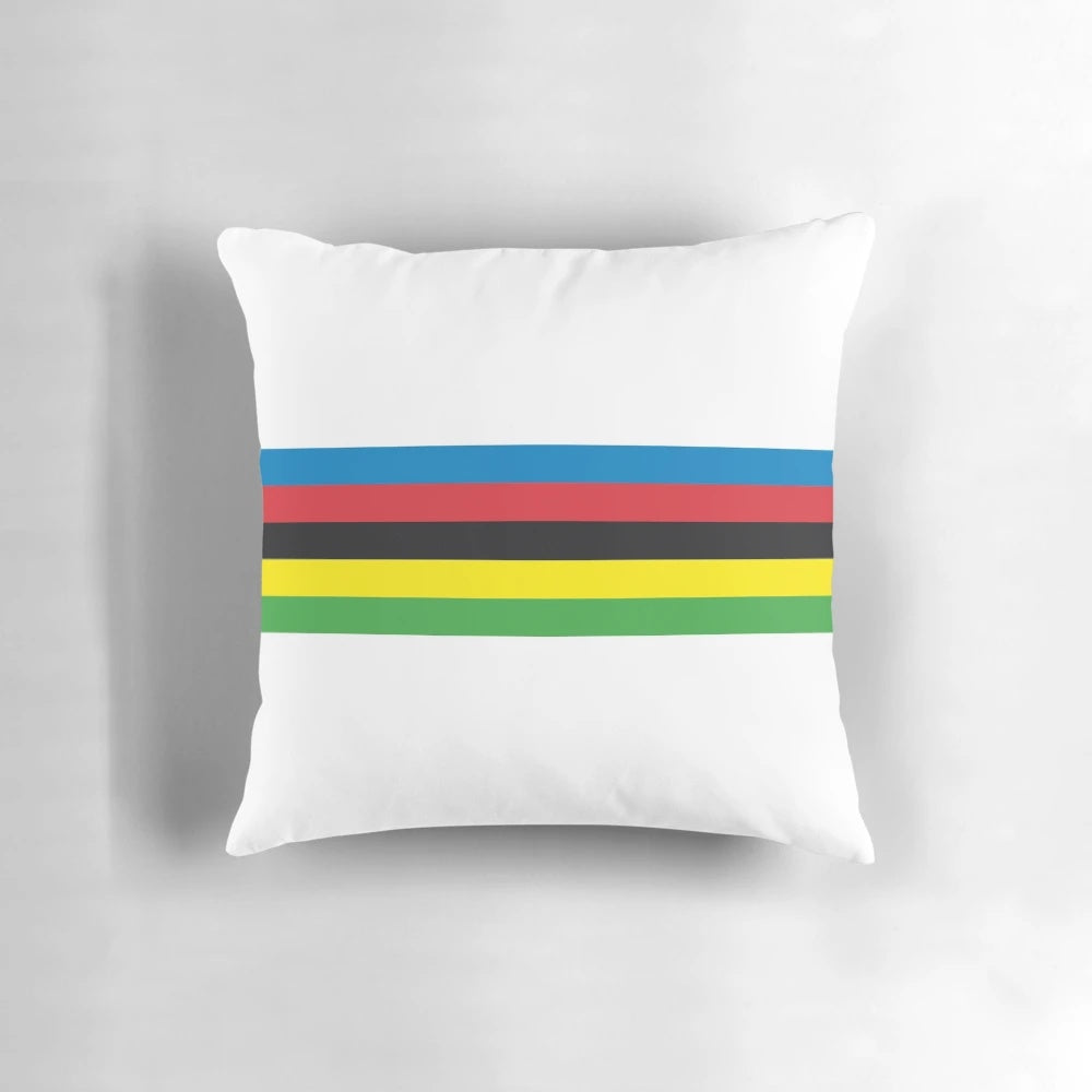 Colorful pillow featuring champion cyclist design with rainbow stripes and bands