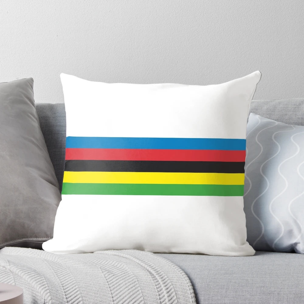 Colorful pillow featuring champion cyclist design with rainbow stripes and bands