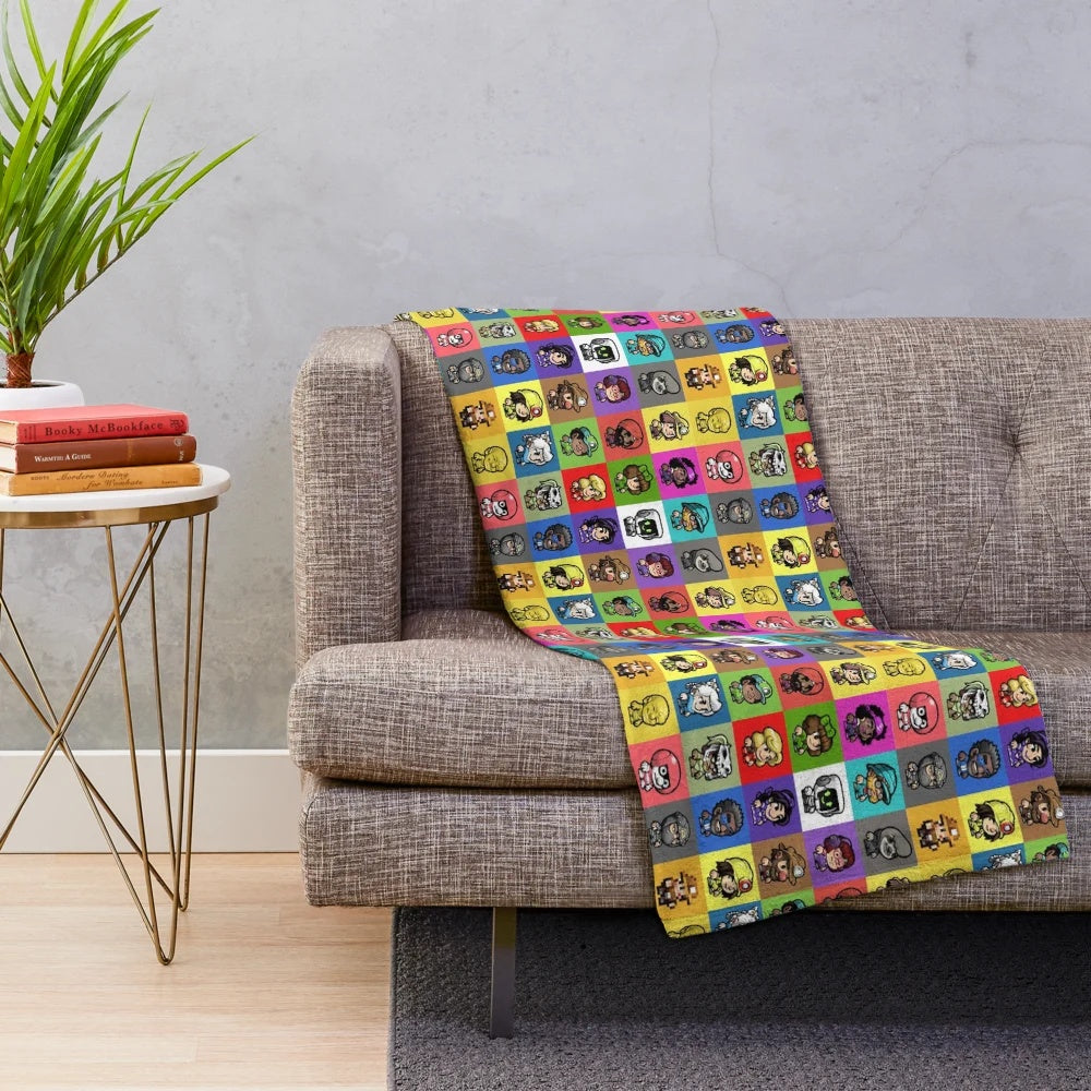 Spelunky 2 inspired plush blanket with cute chibi characters in a multicolored design