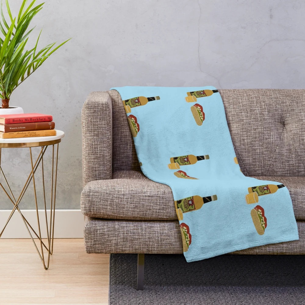 Colorful plush blanket with repeating Chicago-themed pattern