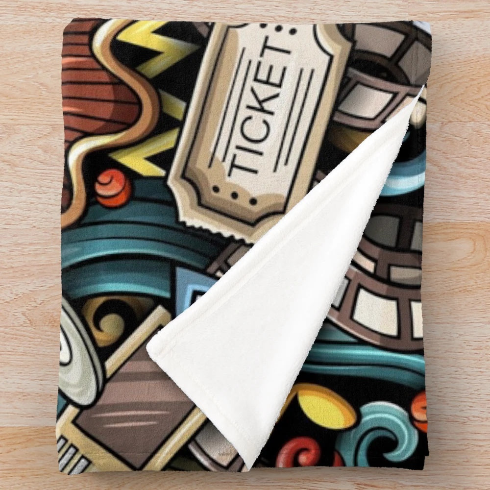 Colorful cinema-themed plush blanket with fun doodle design
