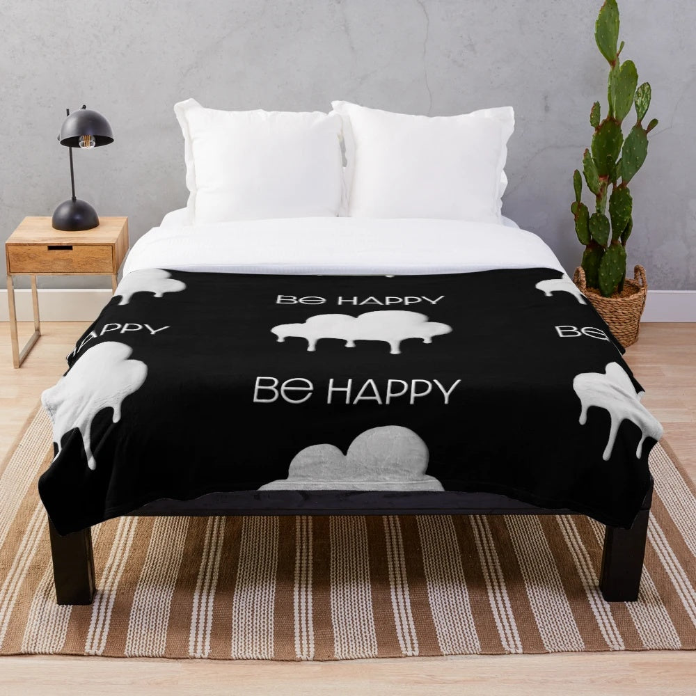 Colorful and soft plush blanket featuring a cloud design inspired by Dixie Damelio's "be happy" persona