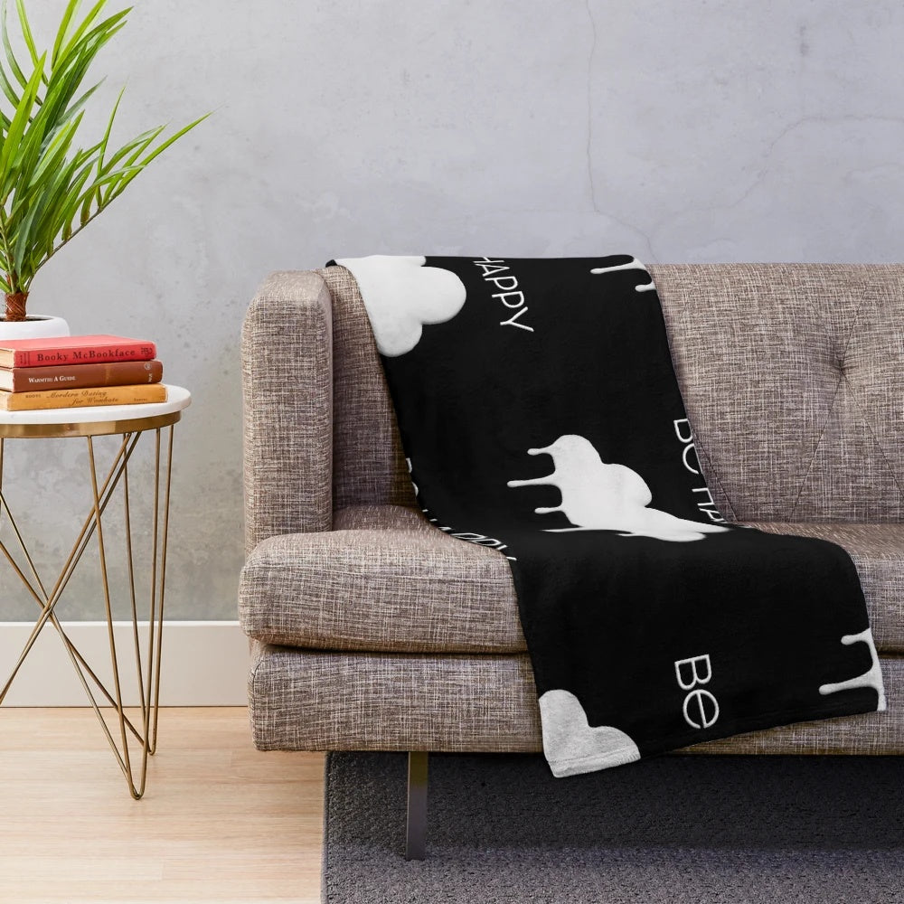 Colorful and soft plush blanket featuring a cloud design inspired by Dixie Damelio's "be happy" persona