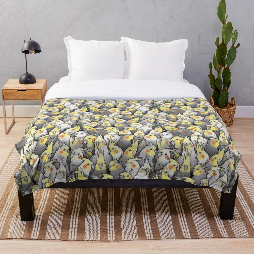 Soft and cozy plush blanket featuring a vibrant cockatiel design