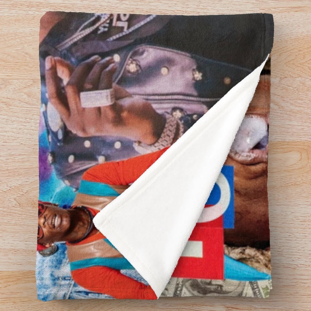 Colorful plush blanket featuring a collage design inspired by the fashion and style of rapper Young Thug