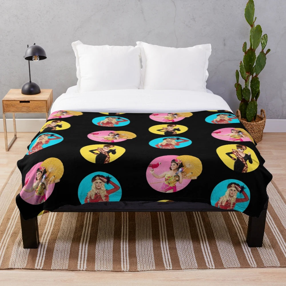 Colorful drag race inspired plush blanket with various drag queen icons