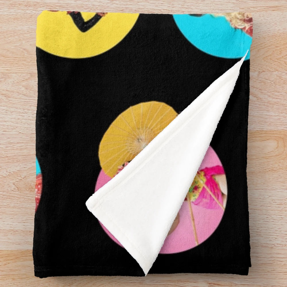Colorful drag race inspired plush blanket with various drag queen icons