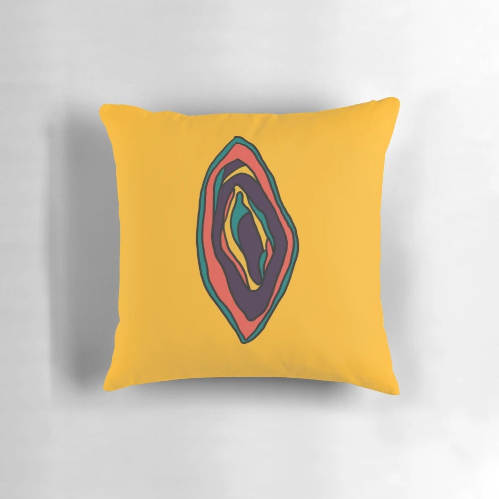 Colorful pillow featuring a vibrant, abstract design of a vagina and vulva, celebrating female empowerment and sexuality.