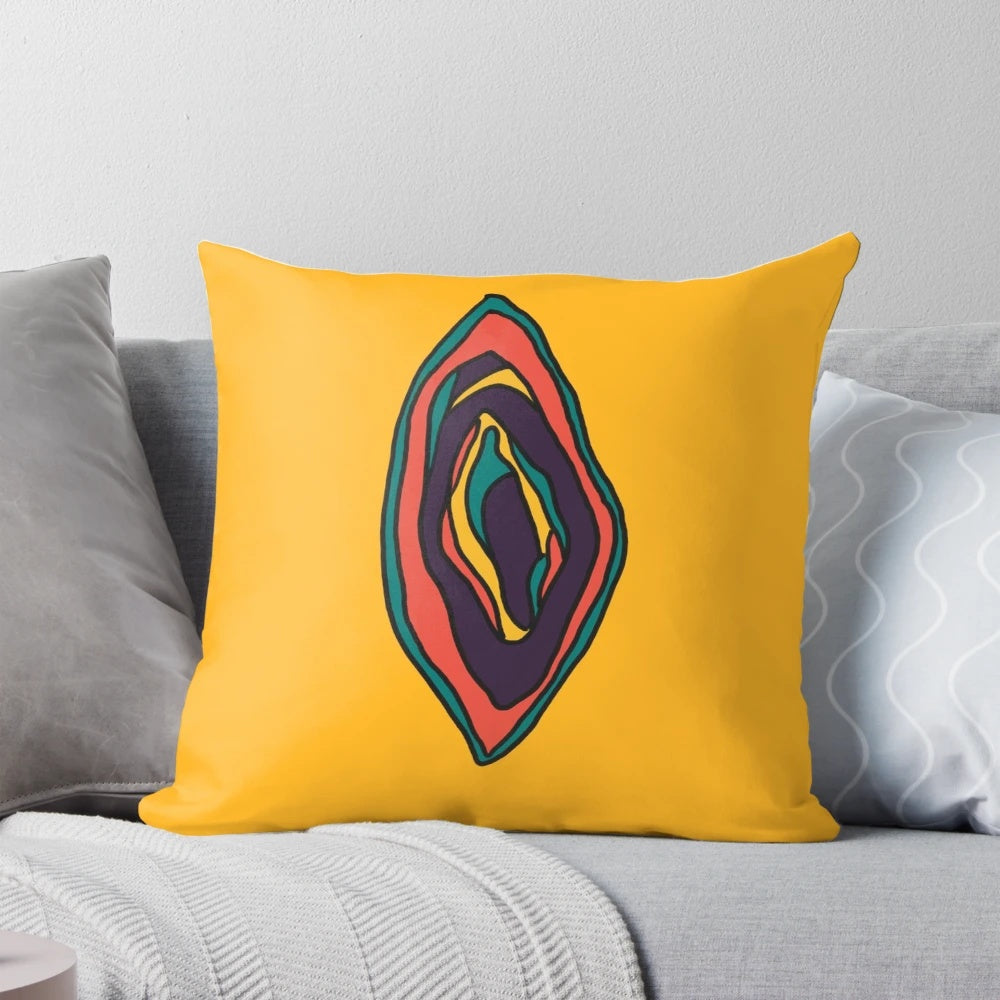 Colorful pillow featuring a vibrant, abstract design of a vagina and vulva, celebrating female empowerment and sexuality.