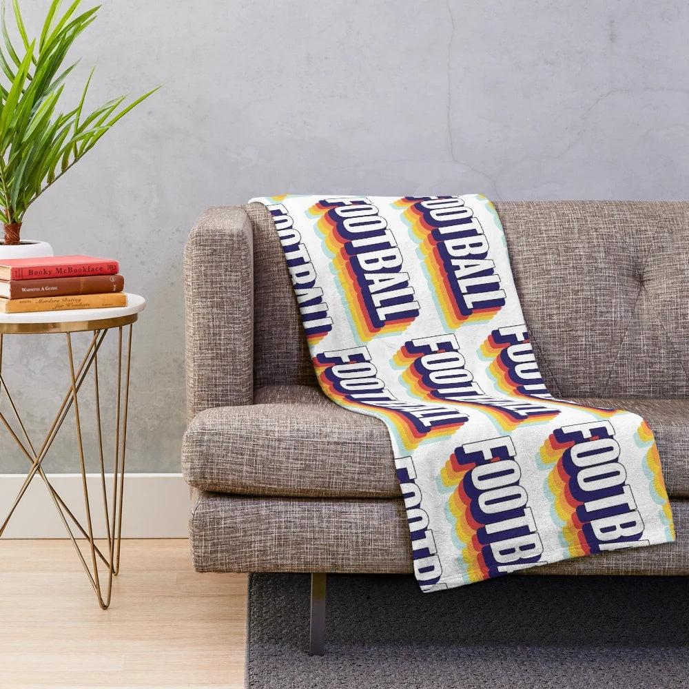 Colorful football-themed plush blanket