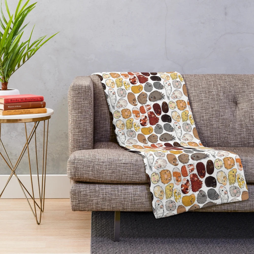 Colorful gradient-patterned plush blanket featuring cute guinea pigs