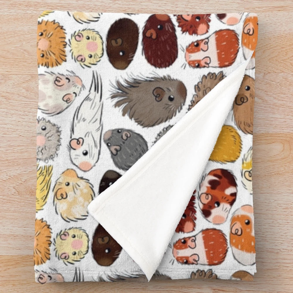 Colorful gradient-patterned plush blanket featuring cute guinea pigs
