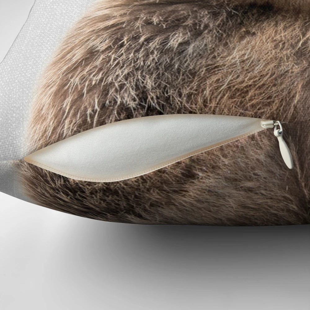 Vibrant illustration of a grizzly bear on a modern, minimalist throw pillow.