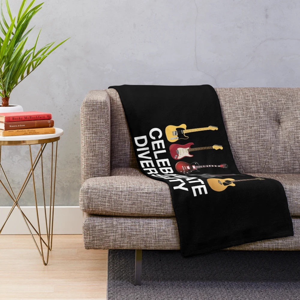 Colorful guitar plush blanket featuring diverse designs