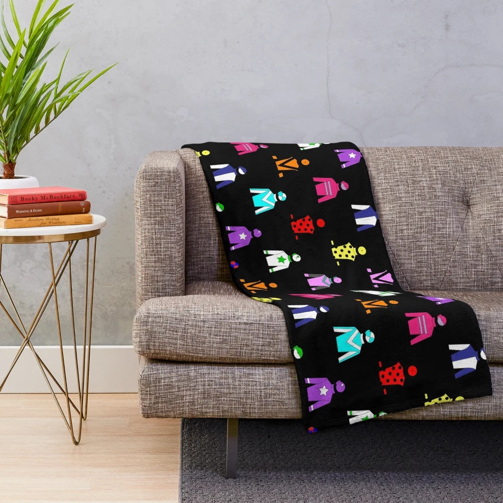Horse racing inspired plush blanket with jockey silks pattern