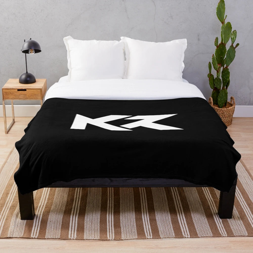 Colorful plush blanket featuring the Ken Roczen logo and nature-inspired design
