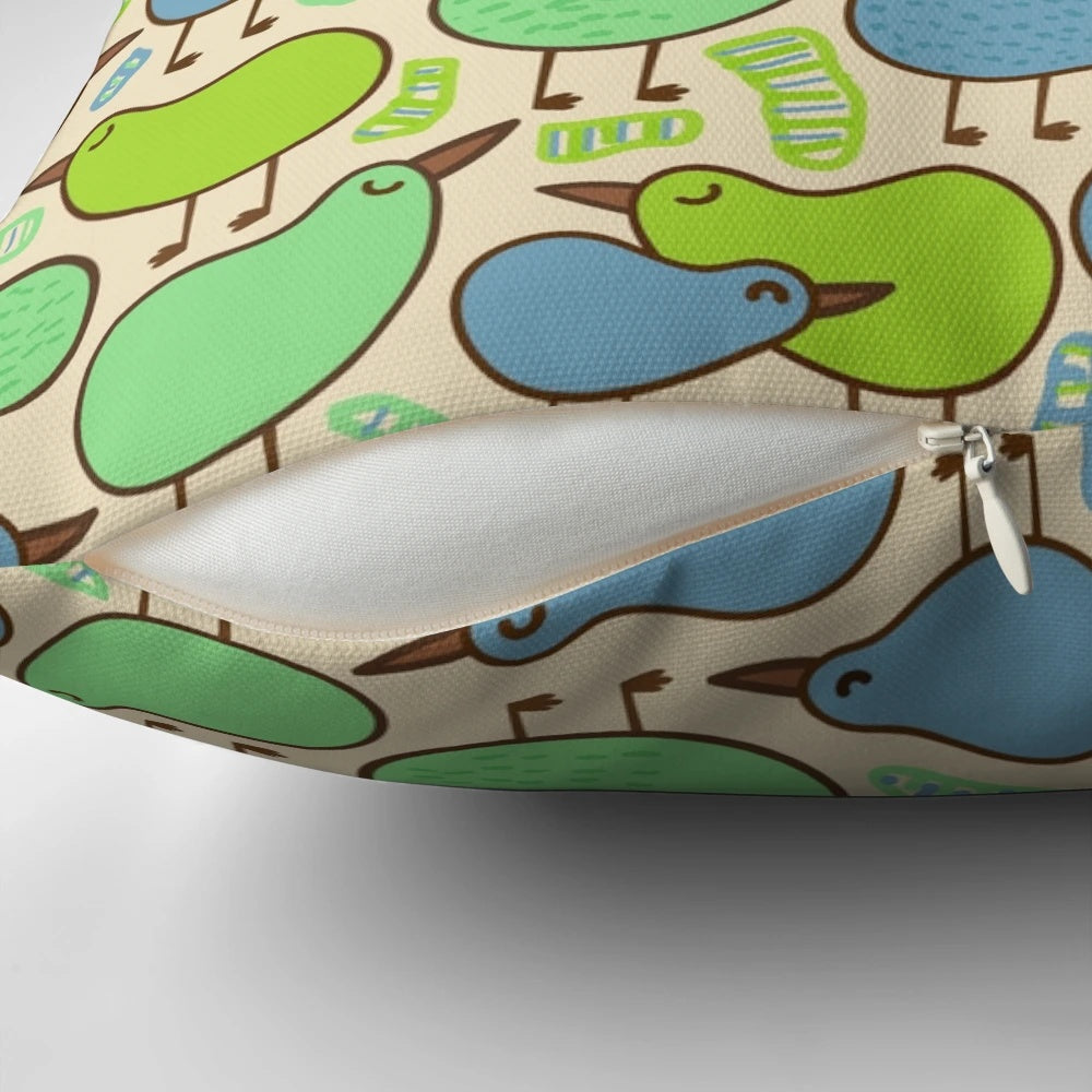 Vibrant kiwi bird pattern printed on a plush, decorative throw pillow