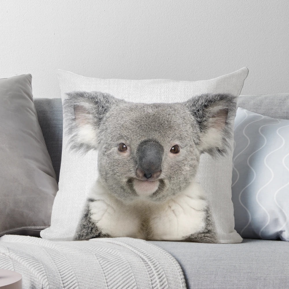 Colorful decorative pillow featuring a koala bear portrait in a modern, minimalist design