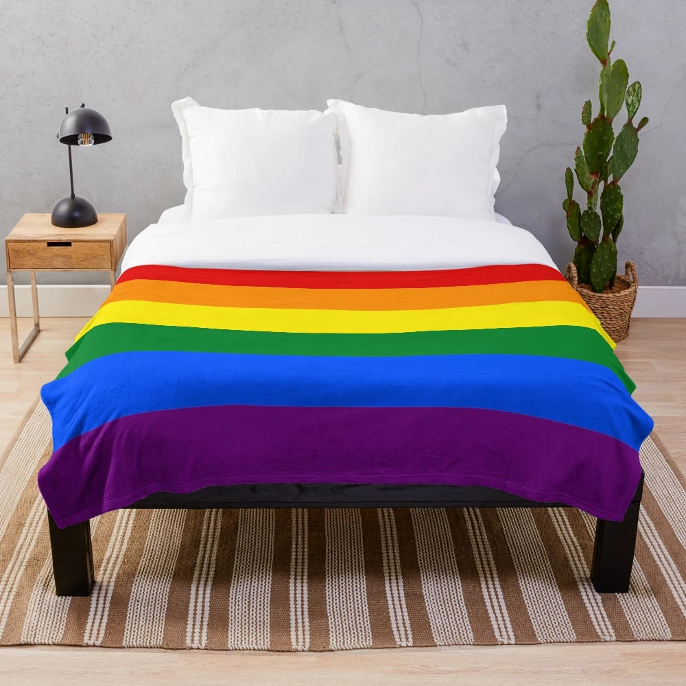 Vibrant LGBTQIA+ pride flag-inspired plush blanket