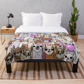 Colorful llama plush blanket with family and friends taking a selfie