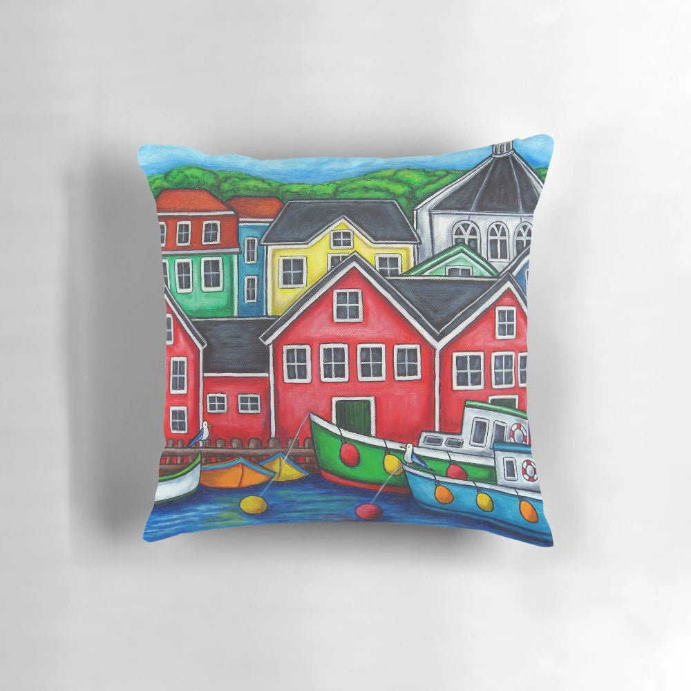Vibrant pillow featuring a colorful scene of fishing boats in Lunenburg, Nova Scotia, Canada.