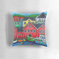 Vibrant pillow featuring a colorful scene of fishing boats in Lunenburg, Nova Scotia, Canada.