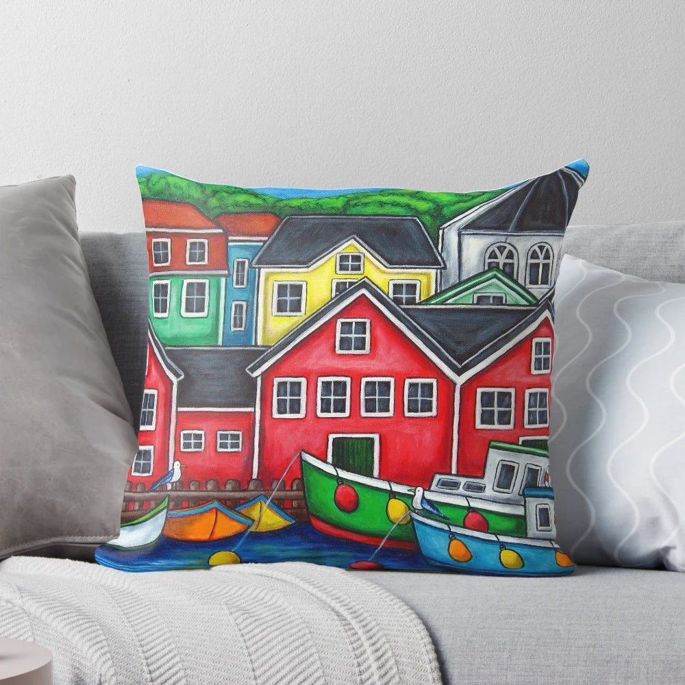 Vibrant pillow featuring a colorful scene of fishing boats in Lunenburg, Nova Scotia, Canada.