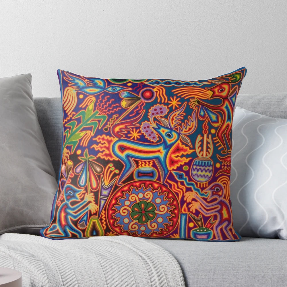 Vibrant, abstract floral and skull-patterned pillow in shades of red, black, and white