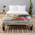 Colorful midcentury modern abstract plush blanket with geometric patterns and bold colors