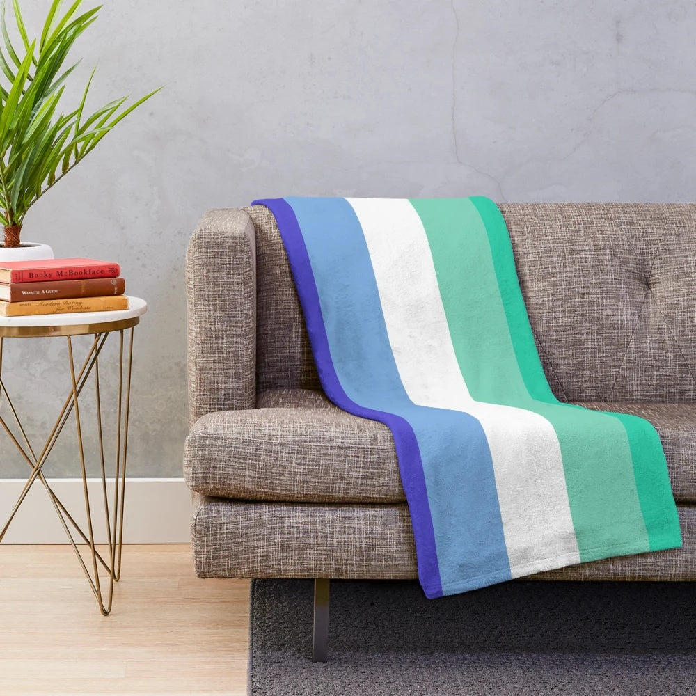 Vibrant MLM gay pride plush blanket with the LGBTQ+ pride flag design