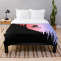 Colorful plush blanket featuring mountain bike-inspired design