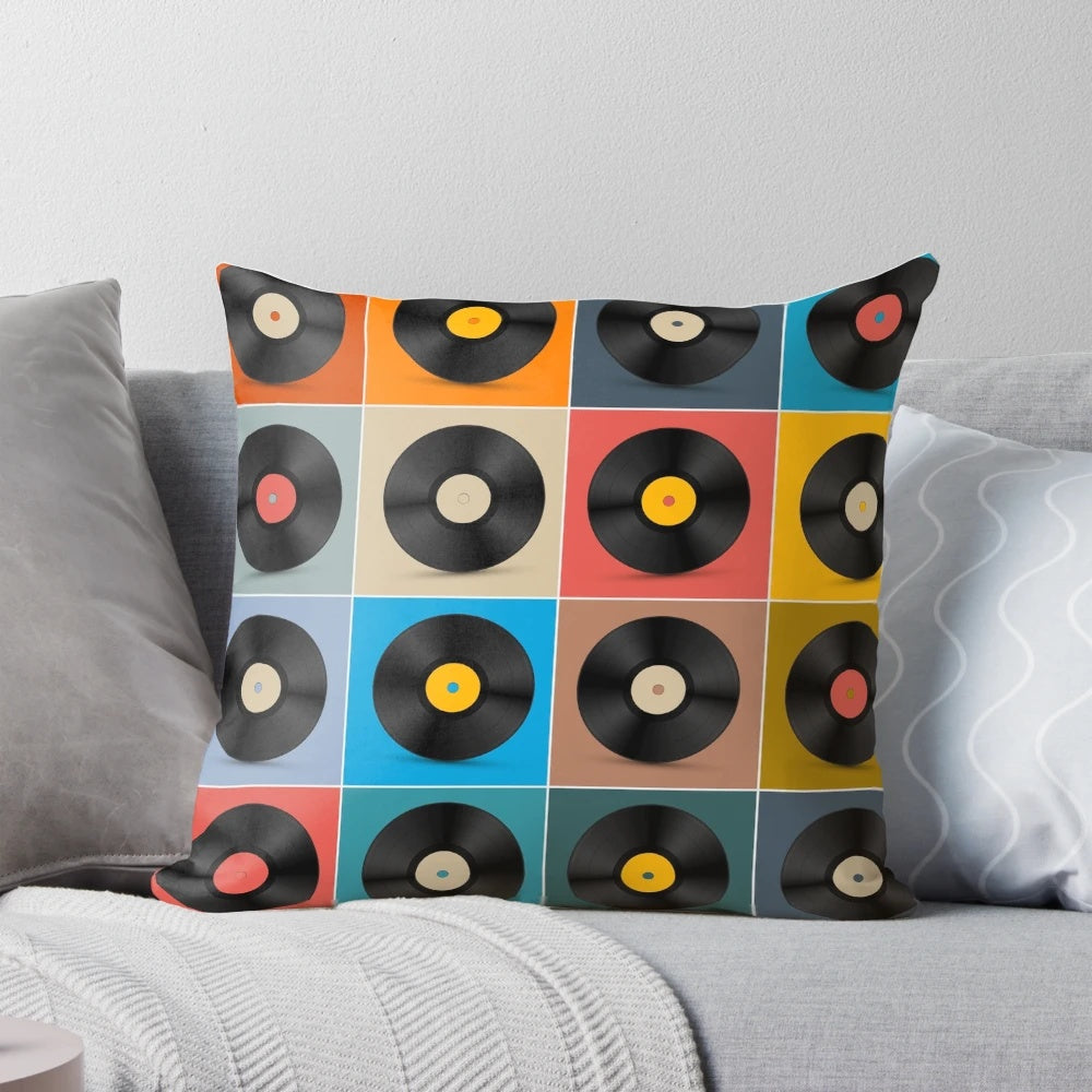 Colorful music poster pillow featuring album and vinyl record designs