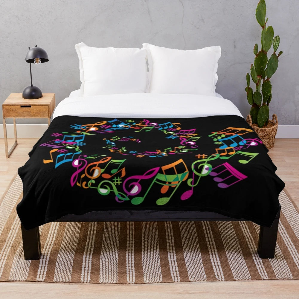 Colorful musical note plush blanket with different instruments and sound waves