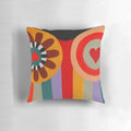 Vibrant Nana painting pillow in homage to French artist Niki de Saint Phalle, featuring colorful stripes and a playful female figure.