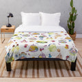 Nopon pattern plush blanket with colorful, nature-inspired design