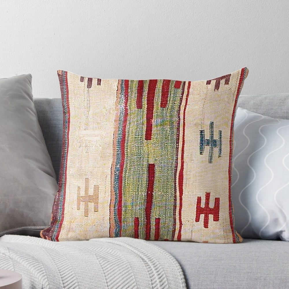 Vibrant bohemian-style accent pillow with an abstract, nature-inspired print in a retro, vintage-inspired design.