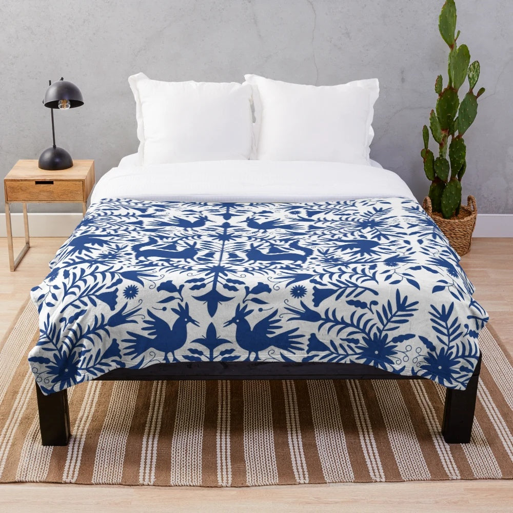 Otomi-inspired colorful plush blanket with Mexican folk art pattern