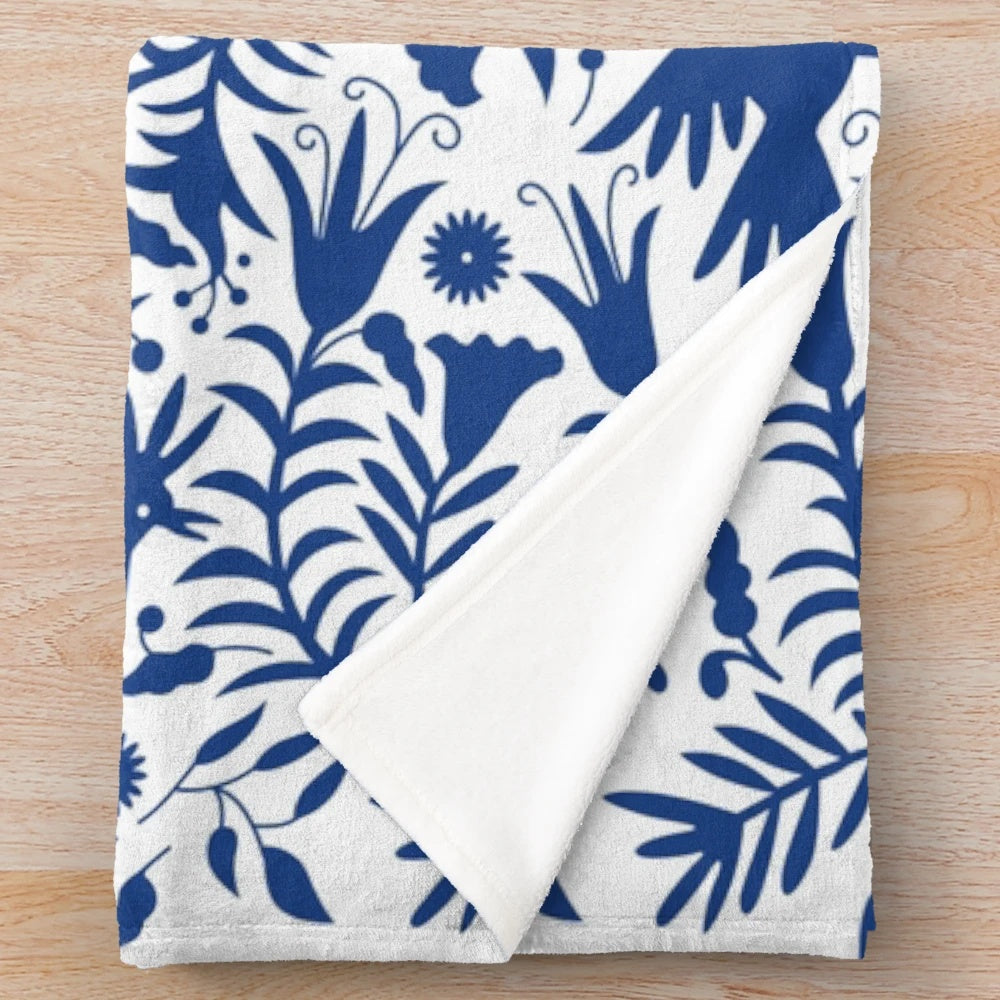 Otomi-inspired colorful plush blanket with Mexican folk art pattern