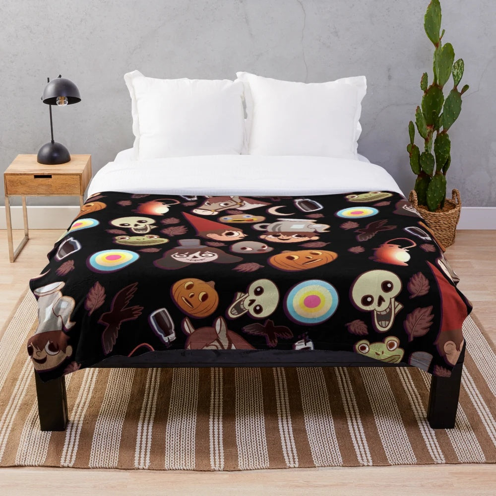 Colorful plush blanket featuring the characters and patterns from the animated show Over the Garden Wall