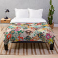 Colorful patchwork plush blanket with floral and vintage patterns